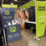 green and blue tradeshow booth display graphic design logo websites